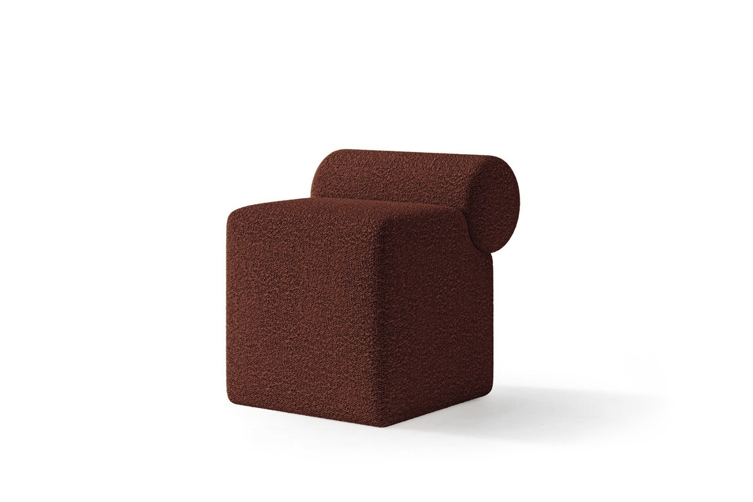 Sleek modern red upholstered chair with a unique cylindrical backrest, perfect for contemporary living spaces and stylish furniture accents.