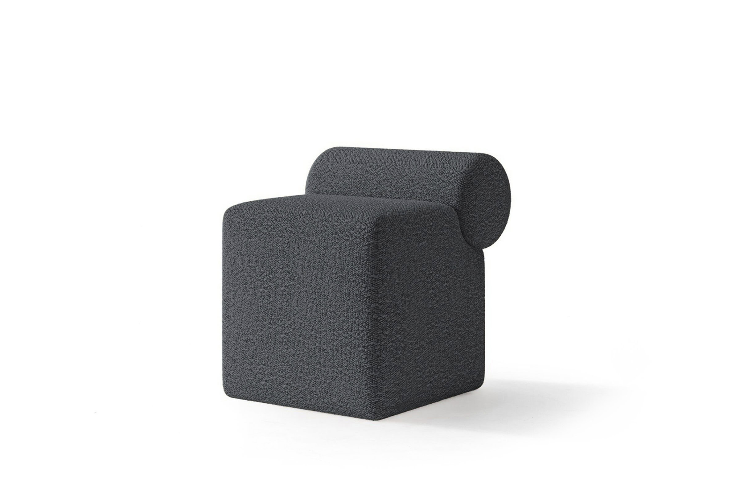 Contemporary black textured accent chair with unique geometric design, ideal for modern living room decor.