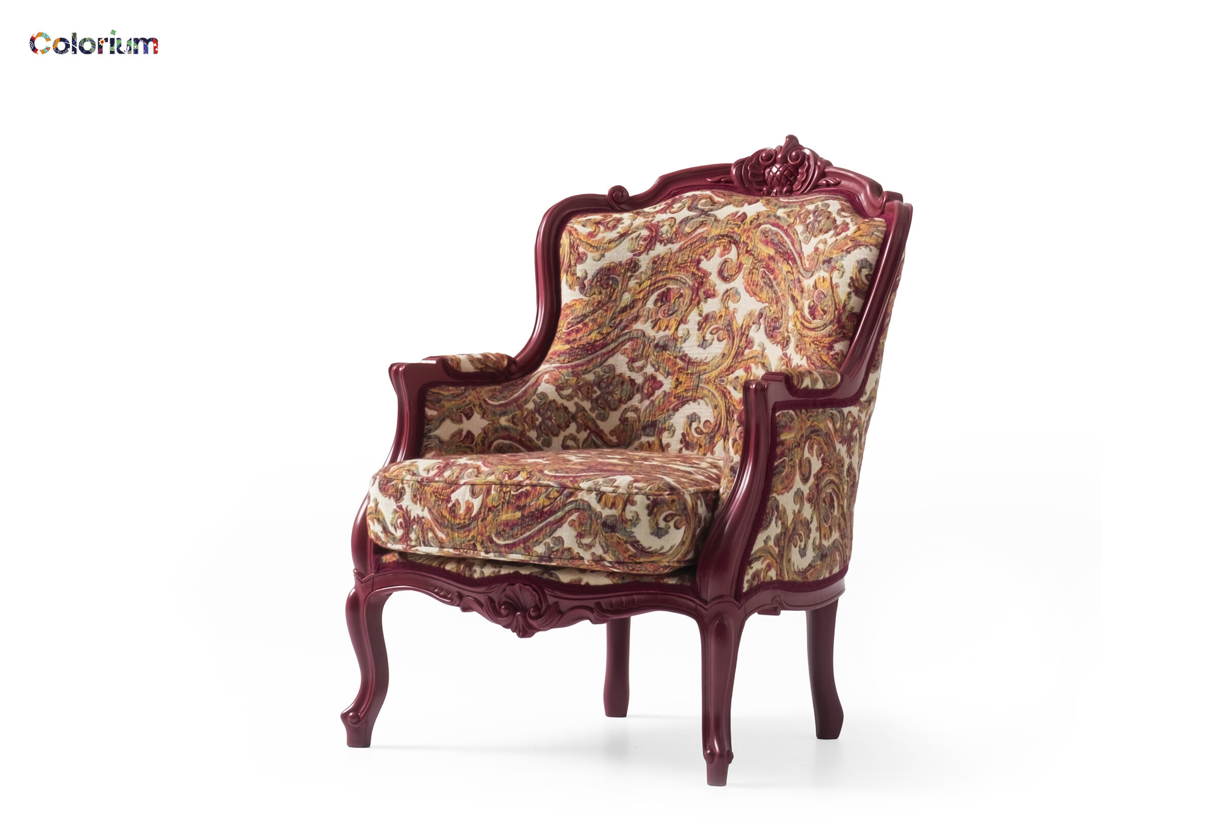 Elegant vintage upholstered armchair with carved wood frame, luxurious floral fabric, and curved legs, perfect for classic and antique interior decor.