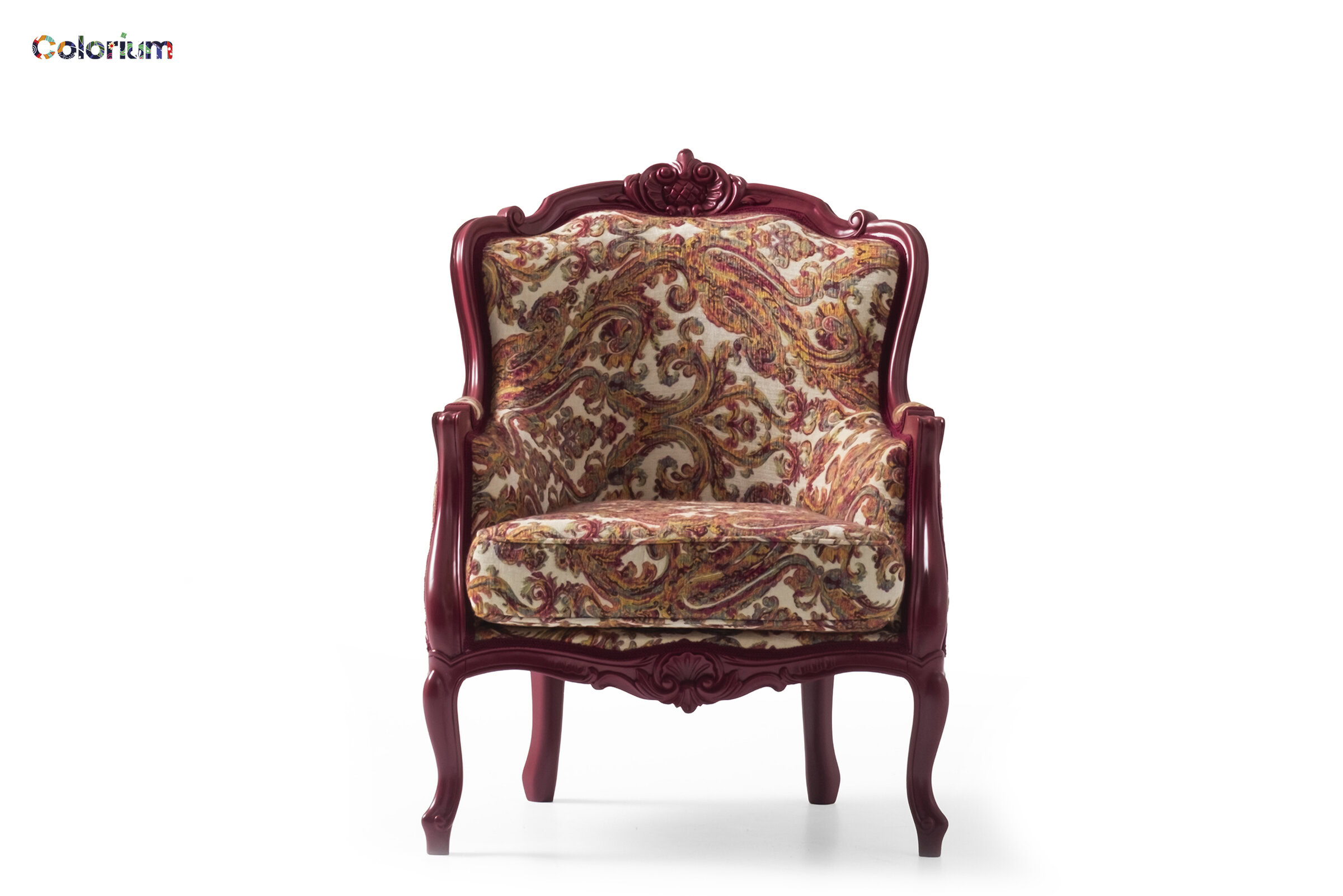 Elegant vintage armchair with intricate wood carvings and plush, patterned upholstery, perfect for classic or luxurious interior decor.