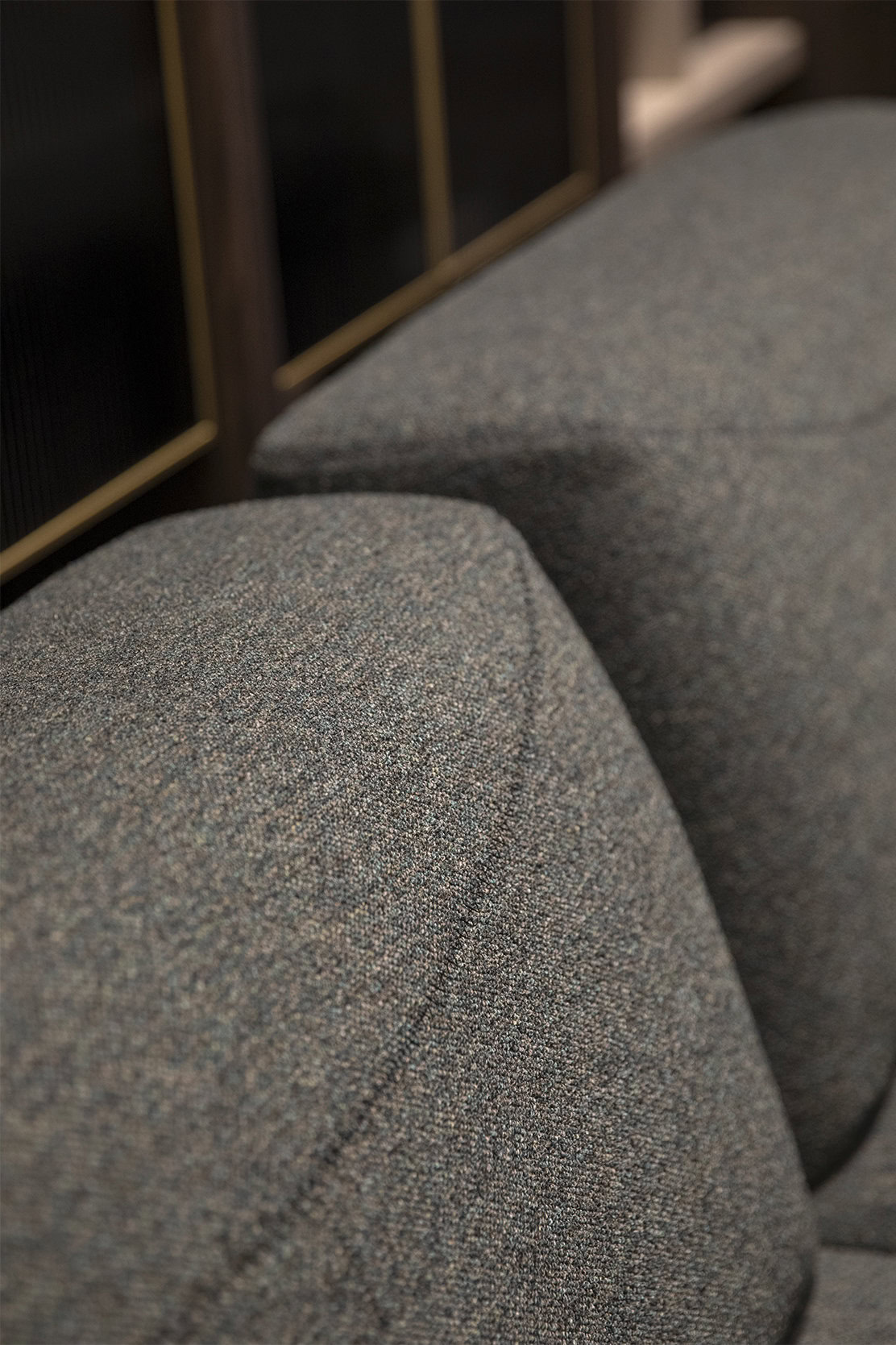 Tapițerie din material textil moale, cu textură fină, pentru o canapea modernă, care evidențiază confortul și durabilitatea, ideală pentru livinguri contemporane și design elegant de mobilier la Saloni Furniture.