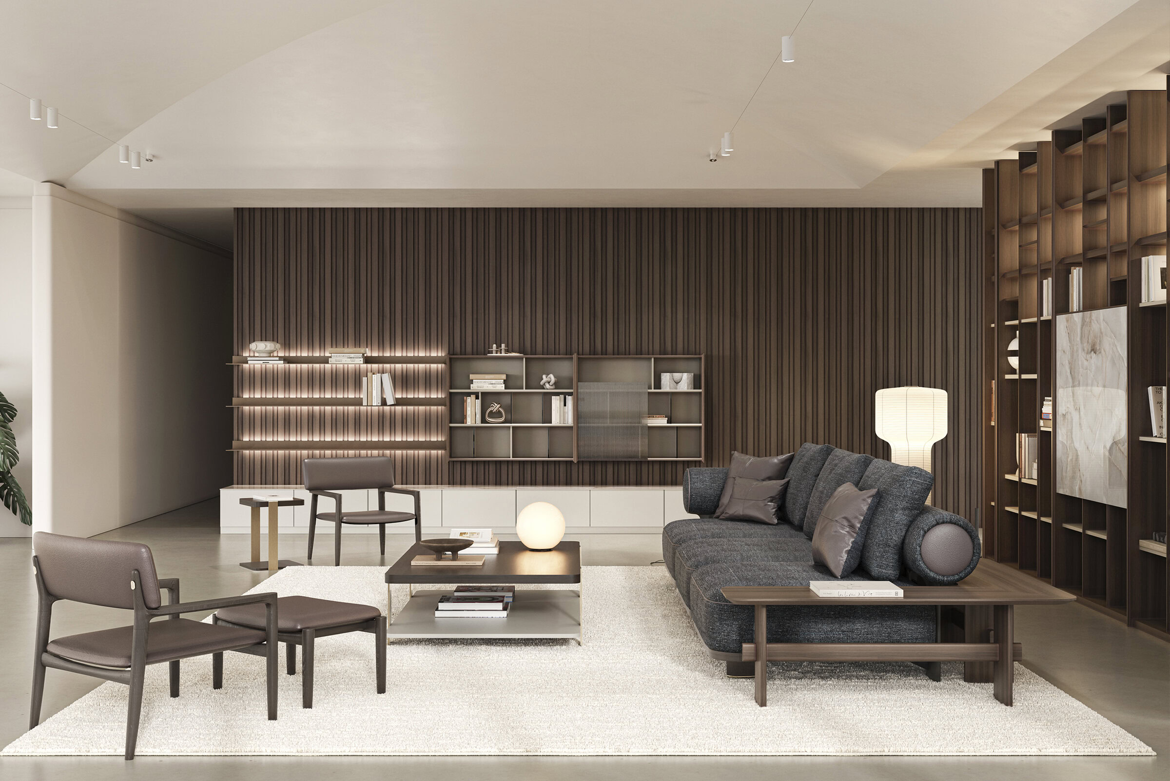 Living elegant, cu bibliotecă din lemn de la Saloni Furniture, canapea confortabilă, scaune moderne și iluminat cald, creând o ambianță intimă și sofisticată.