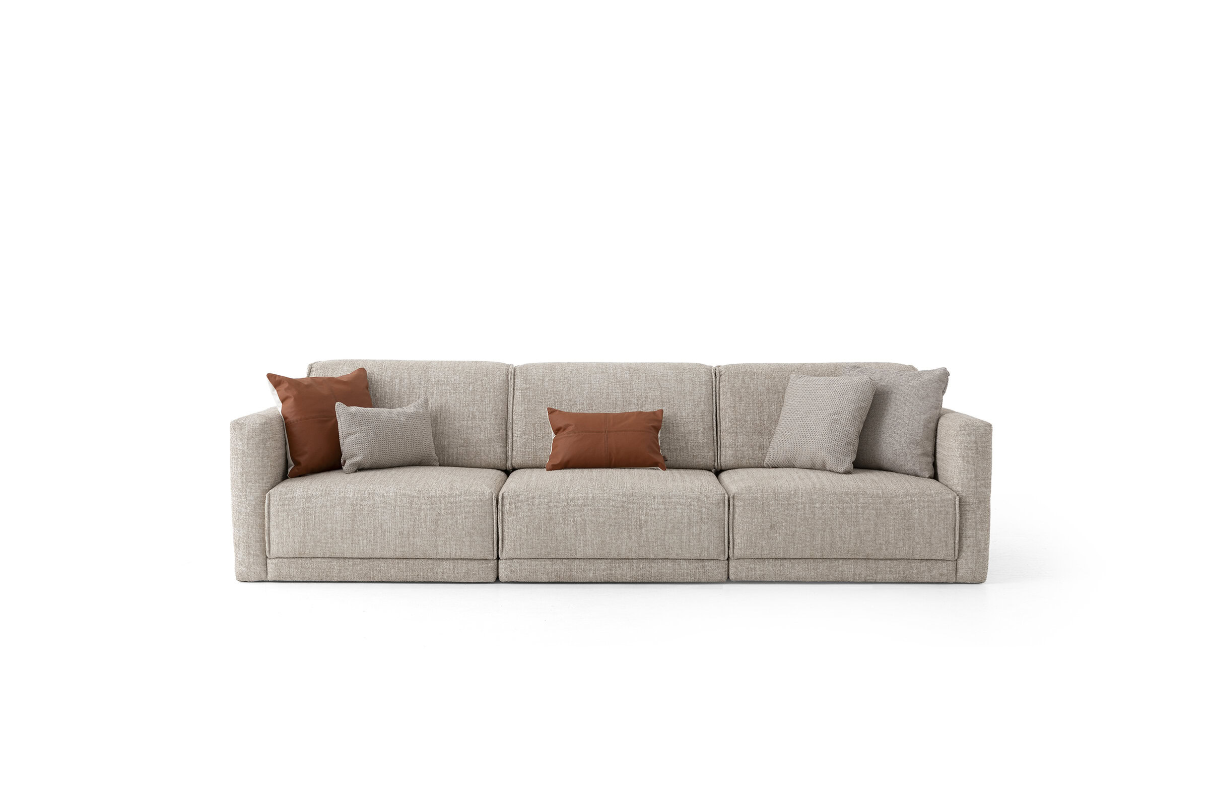 Elegant beige fabric sofa with four cushions in earthy tones, suitable for sophisticated living room decor. Perfect for stylish, comfortable lounging or entertaining guests.