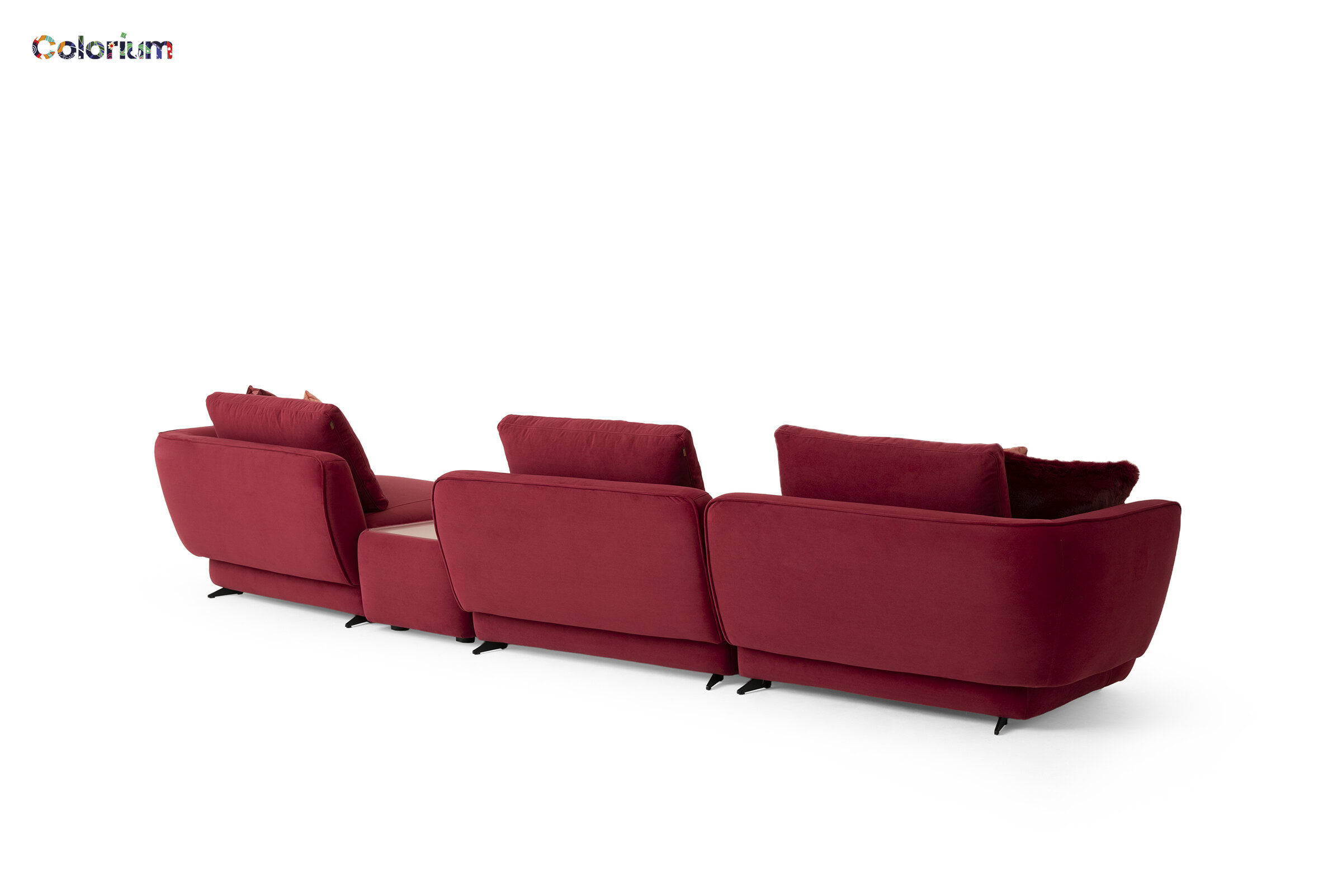 Stylish red sofa with plush cushions, perfect for contemporary living rooms and adding a vibrant touch to your home decor.