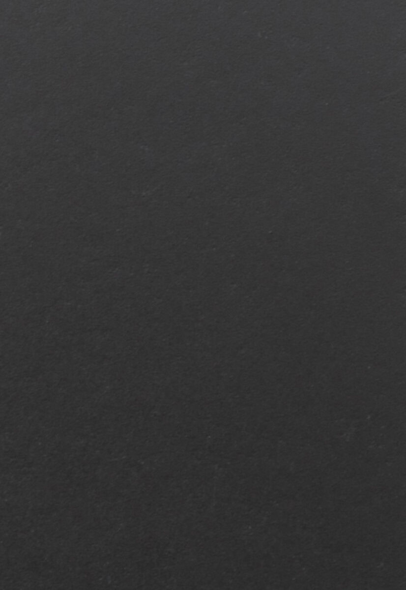 Smooth black matte furniture surface for modern interior design | Saloni Furniture.
