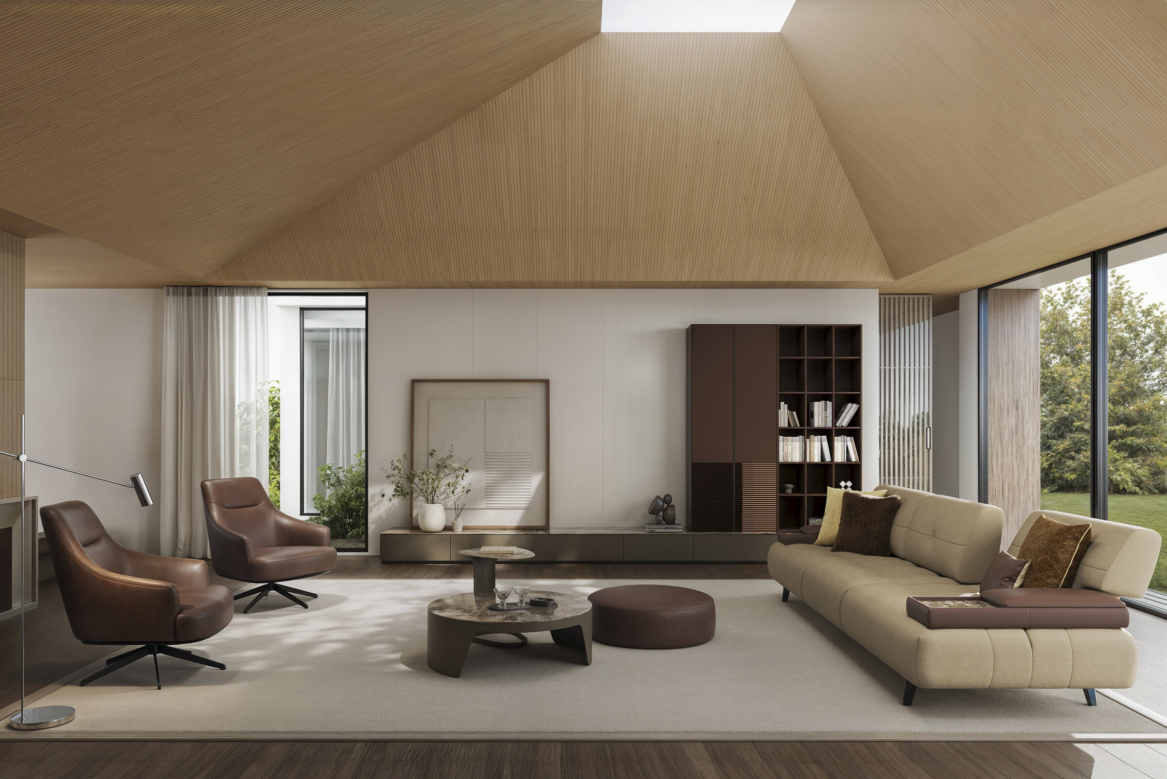 Elegant modern living room with contemporary furniture, large windows, and natural light, showcasing Saloni Furniture's stylish designs.