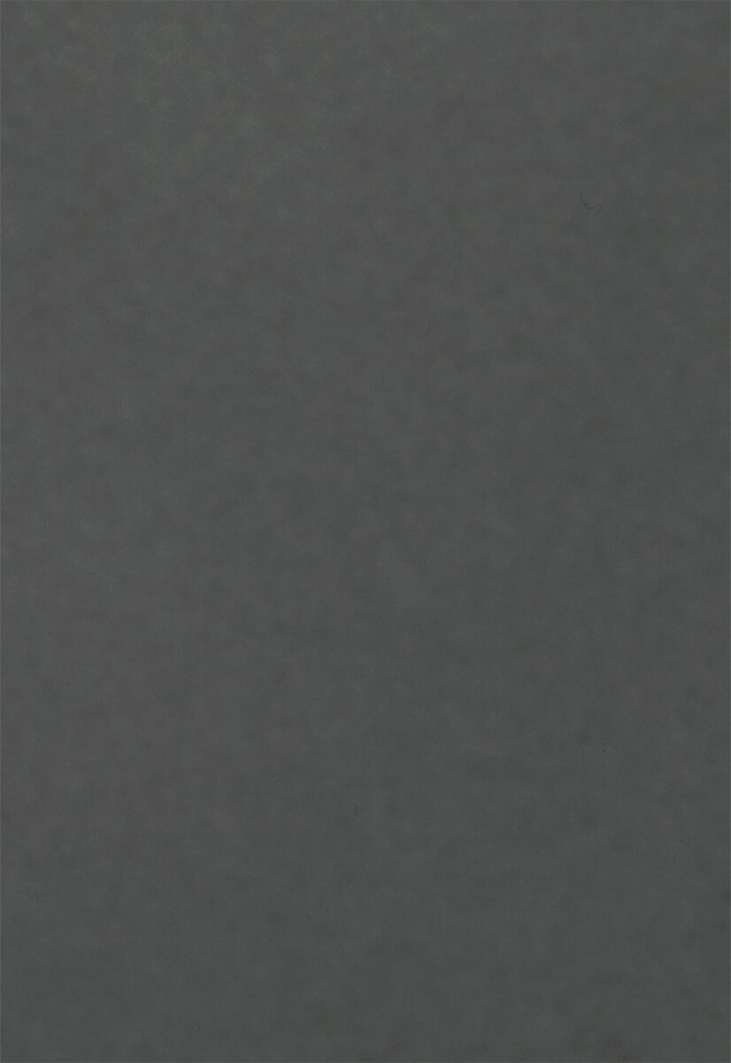 Sleek matte black furniture surface showcasing modern design elements. Perfect for contemporary living spaces, blending style with functionality. Ideal for creating elegant and stylish interiors.