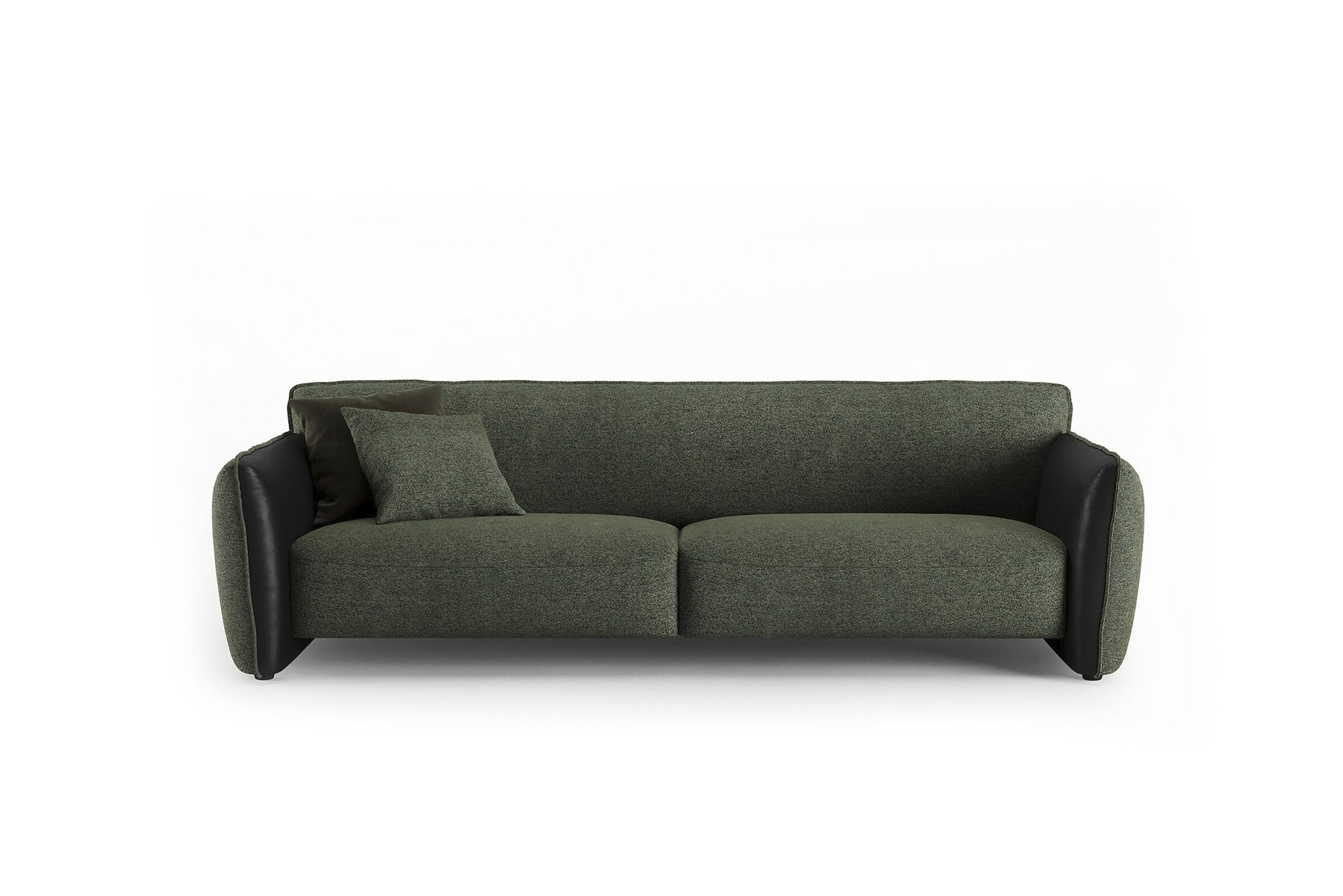 Canapea contemporană verde cu accente din piele neagră, perne confortabile și design modern, ideală pentru un decor elegant al camerei de zi.
