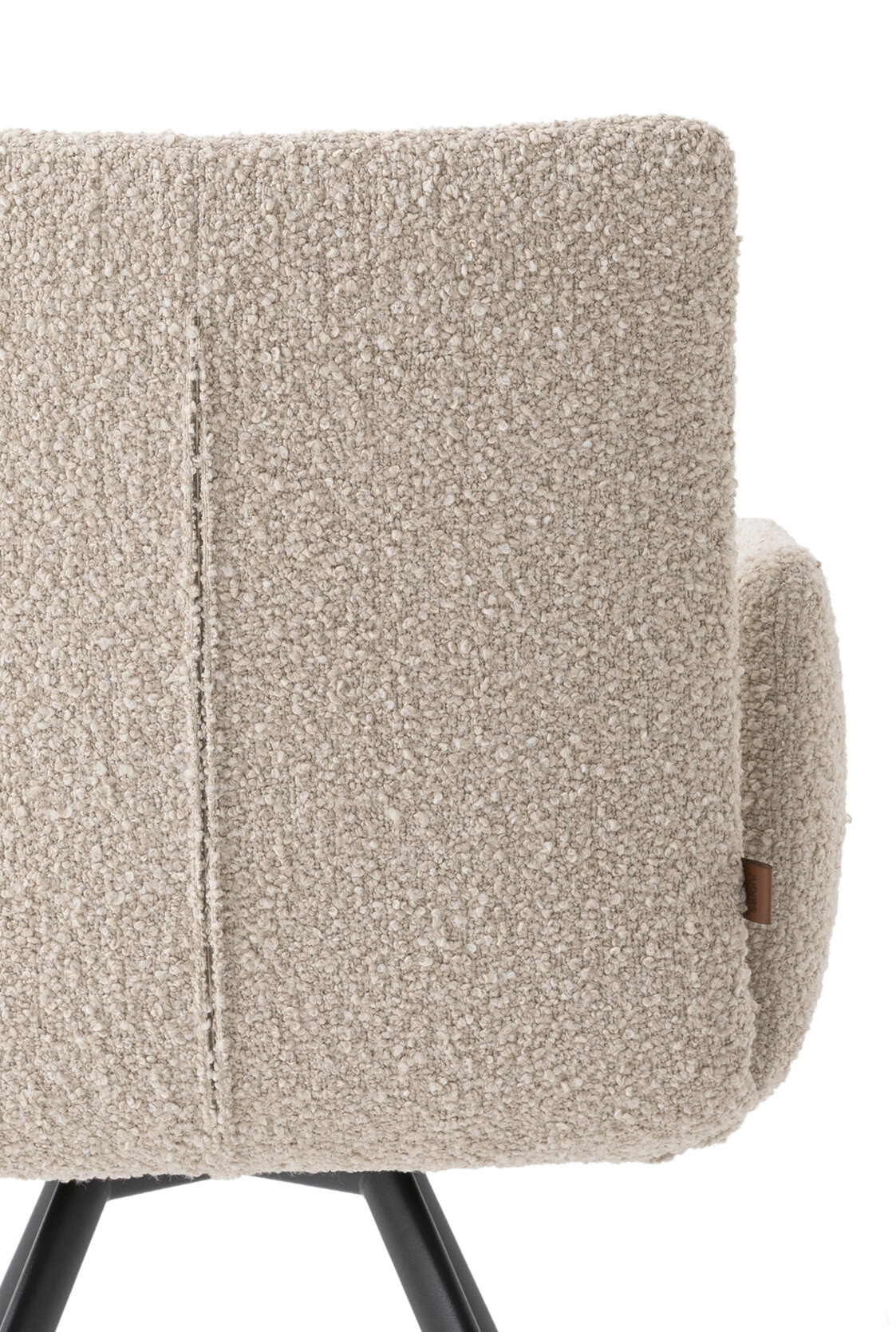 Comfortable beige armchair with plush textured fabric, modern design, and black wooden legs, ideal for living rooms and lounge areas.