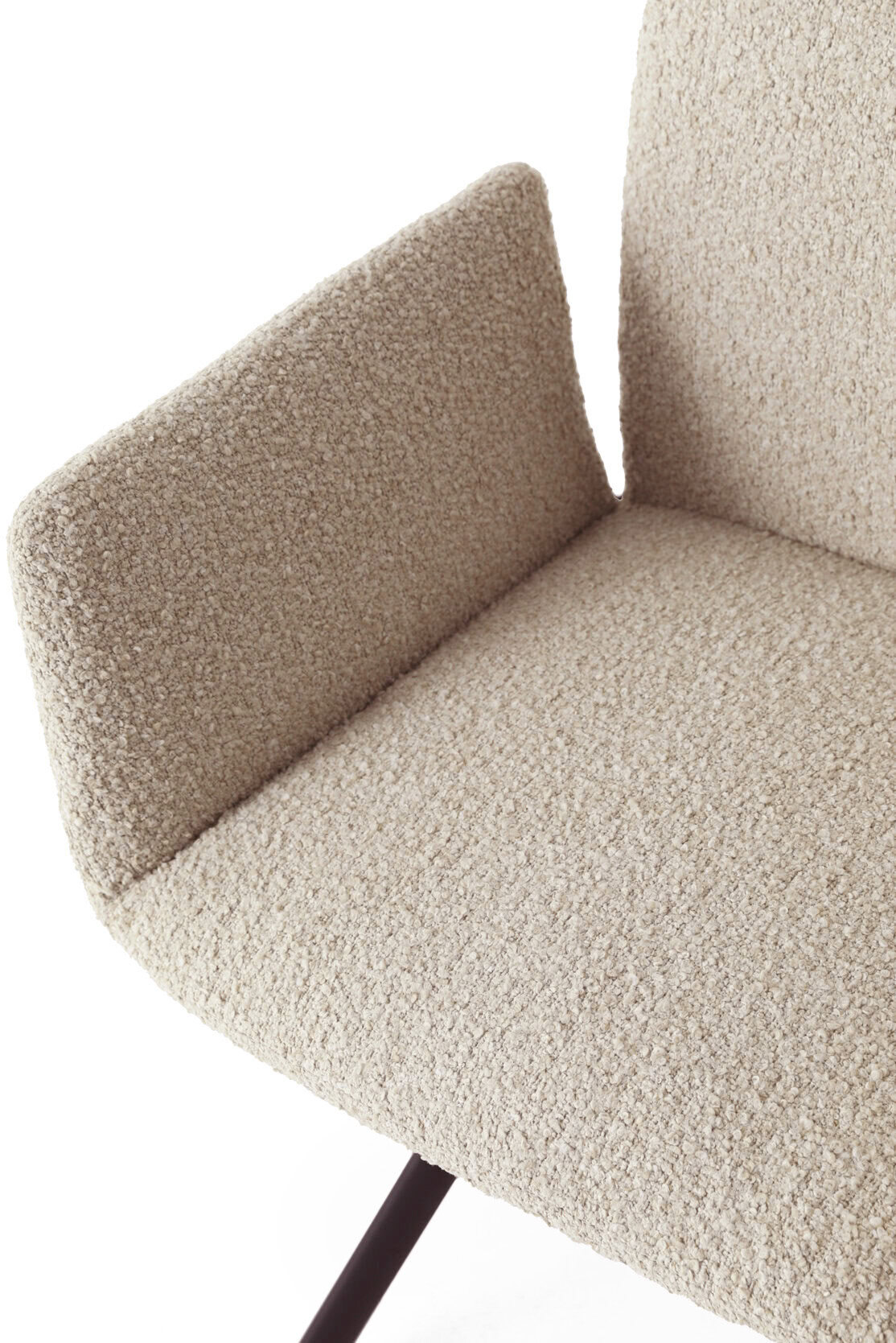 Modern beige upholstered armchair with plush fabric and sleek wooden legs, perfect for contemporary living rooms and stylish interiors.